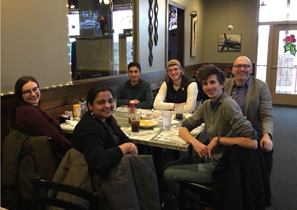 Lab members form 2018 at lunch at Main Street Pub